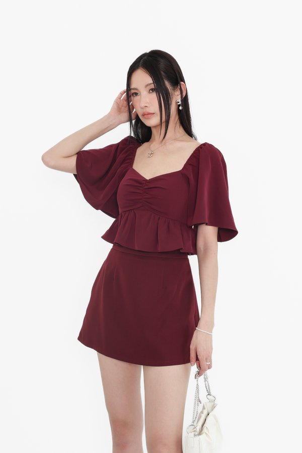 *TPZ* CLOVER BABY PEPLUM FLUTTER TOP IN DEEP BURGUNDY