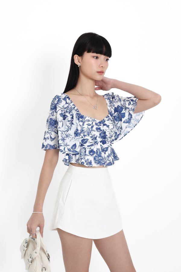 *TPZ* CLOVER BABY PEPLUM FLUTTER TOP IN TOILE DE FATE BLUE