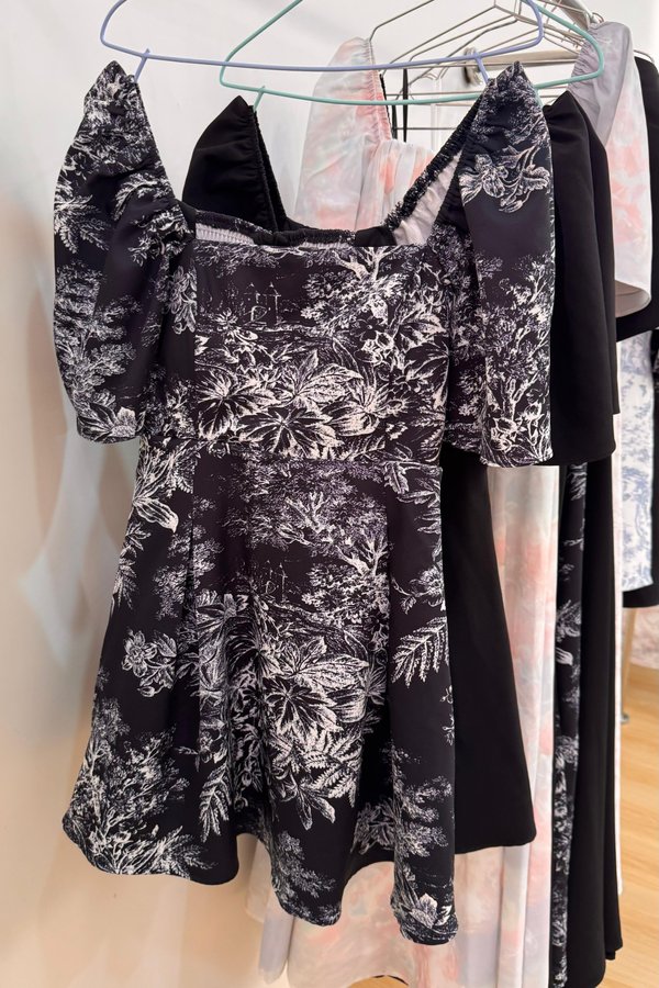 (PREORDER) *TPZ* ELLE FLUTTER SLEEVES DRESS ROMPER 2.0 WITH DETACHABLE SHORTS IN SIGNATURE BLACK TOILE
